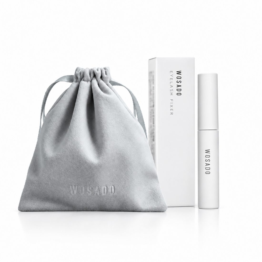 WOSADO Magnetic Lash Care Essentials: one grey microfiber drawstring pouch and one white Eyelash Fixer with its carton. Magnetic lashes are not included.